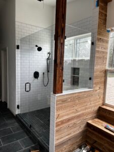 seam-less frame-less shower enclosure