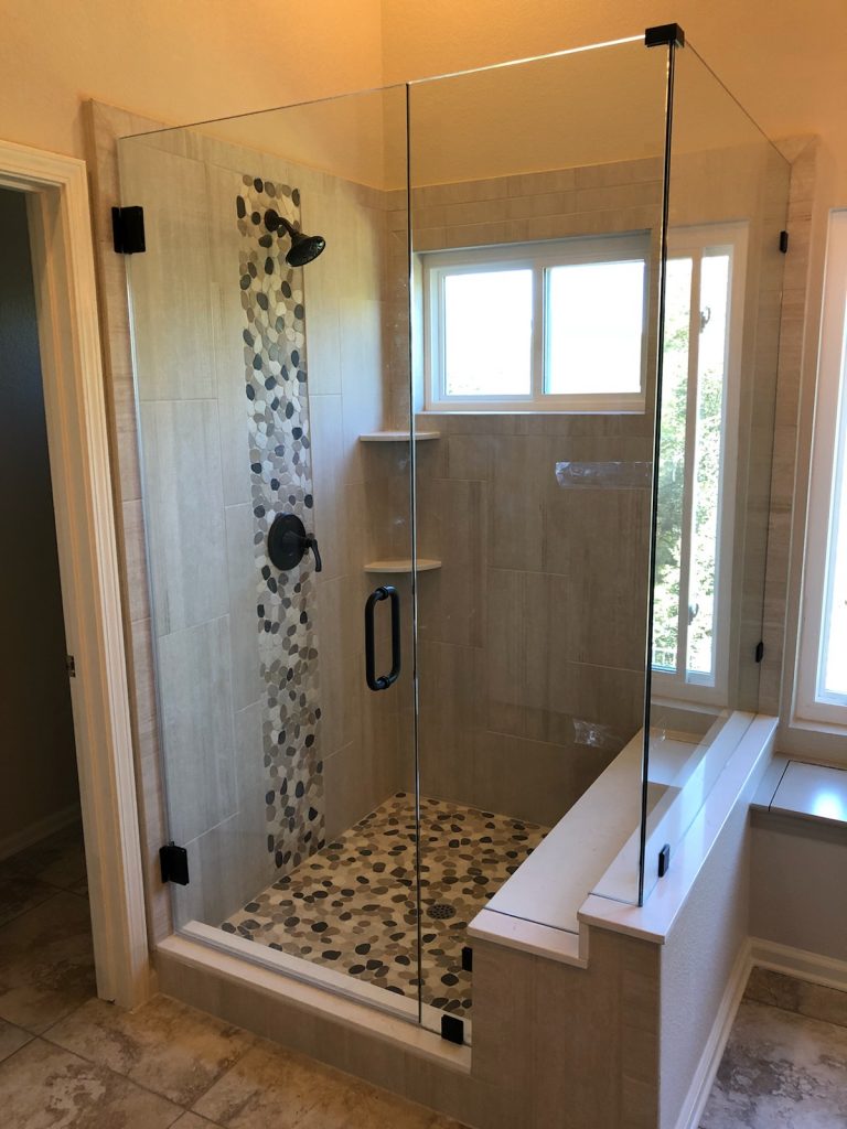 double-notched-panel-heavy-frameless-shower
